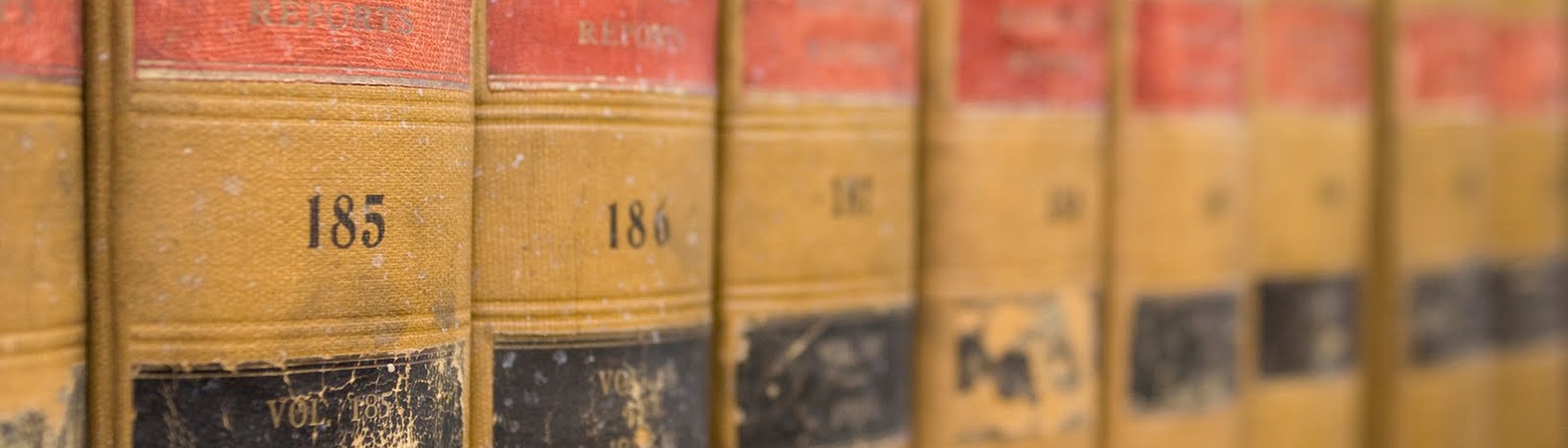 Law library volumes representing tax expertise and legal knowledge